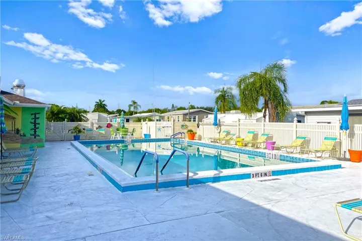 View of swimming pool with a patio area