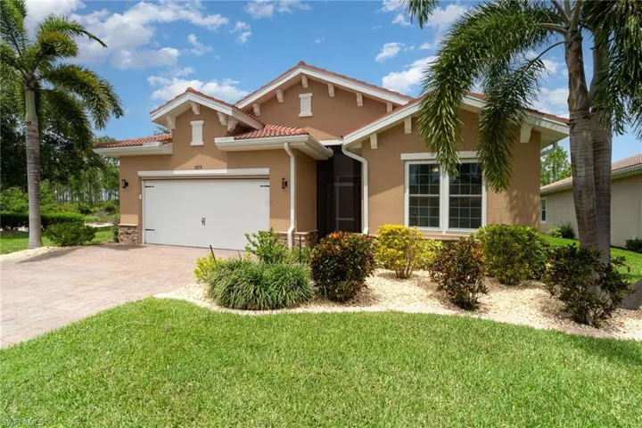 Beautifully landscaped.  Landscape and lawncare is included in the HOA.