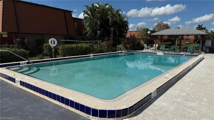 Pool with lounge area.