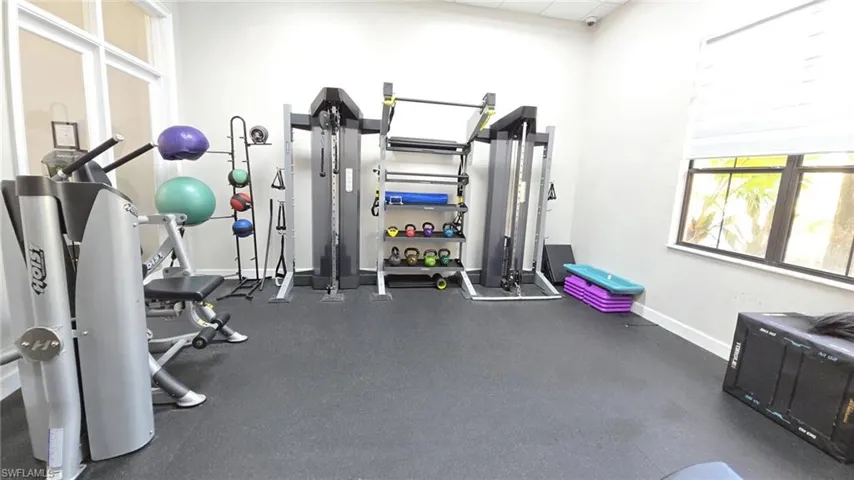 Gym featuring baseboards