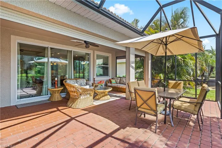 Enjoy the serene lake views from your covered lanai.