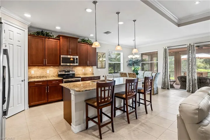 Enjoy extra seating and a cozy spot for morning coffee or chatting while you cook.