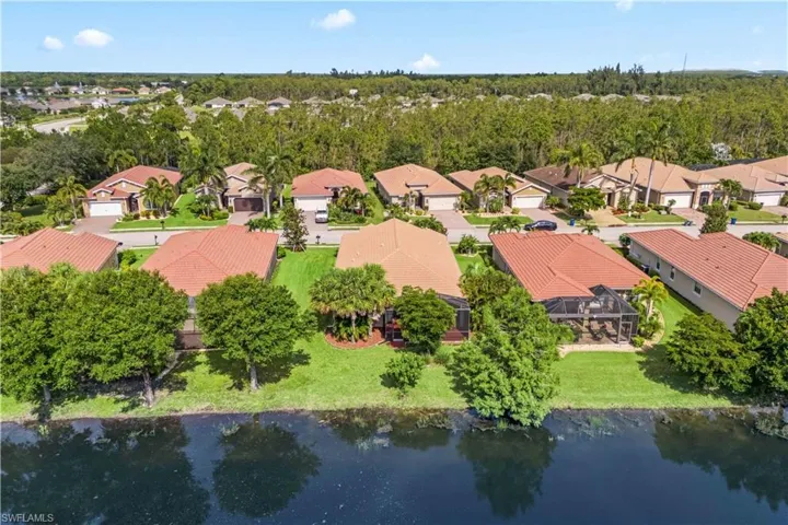 Enjoy a bird’s-eye view of the beautifully maintained backyard, ideal for Florida’s indoor-outdoor lifestyle.