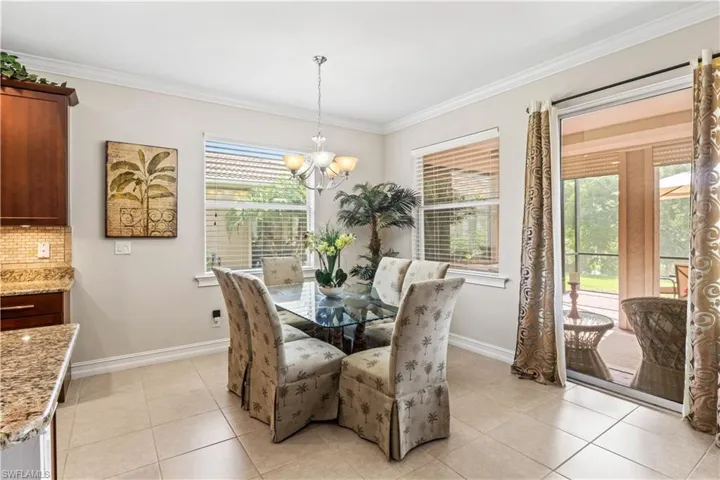 Enjoy every meal with tranquil lake views from this bright and inviting dining area.