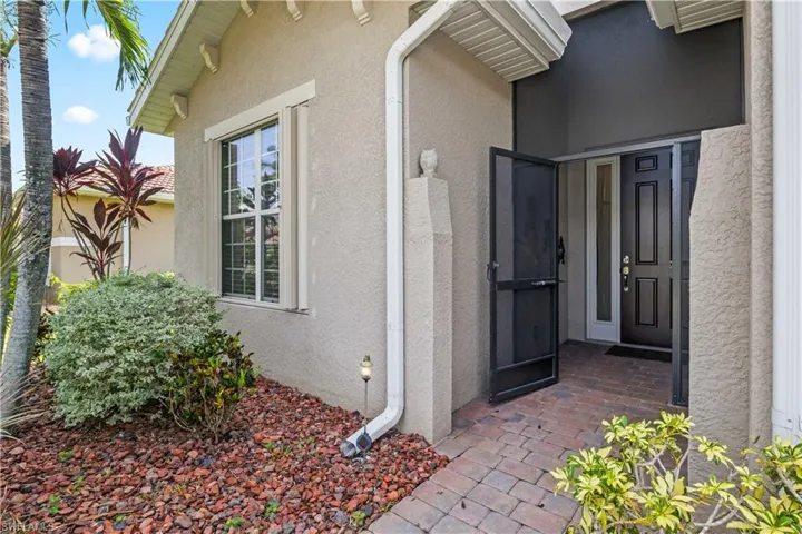 Greet guests in comfort with a screened front area that blends function and charm.