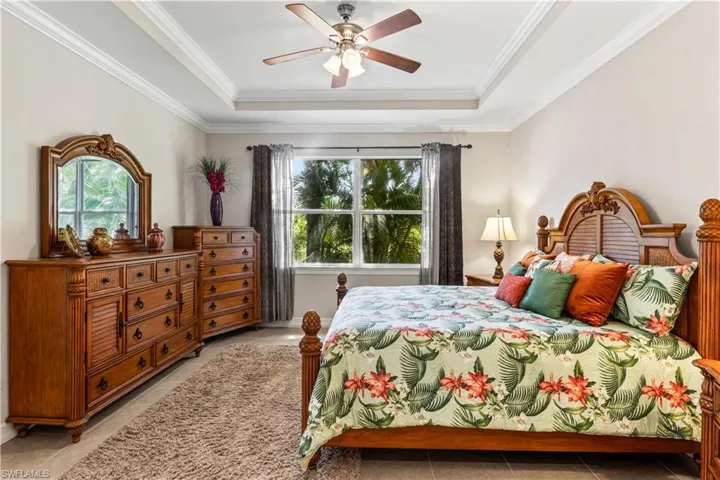 Comfort and privacy await in this generously sized suite with room for a sitting area.