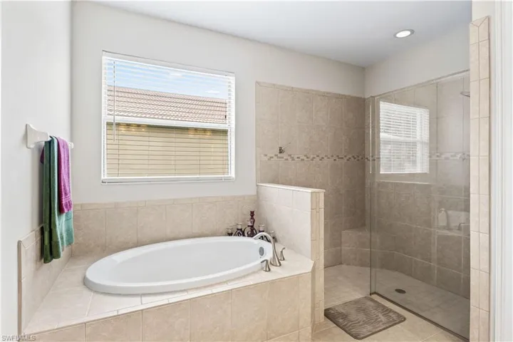 Unwind in the soaking tub or enjoy the spacious walk-in shower—your personal spa retreat.