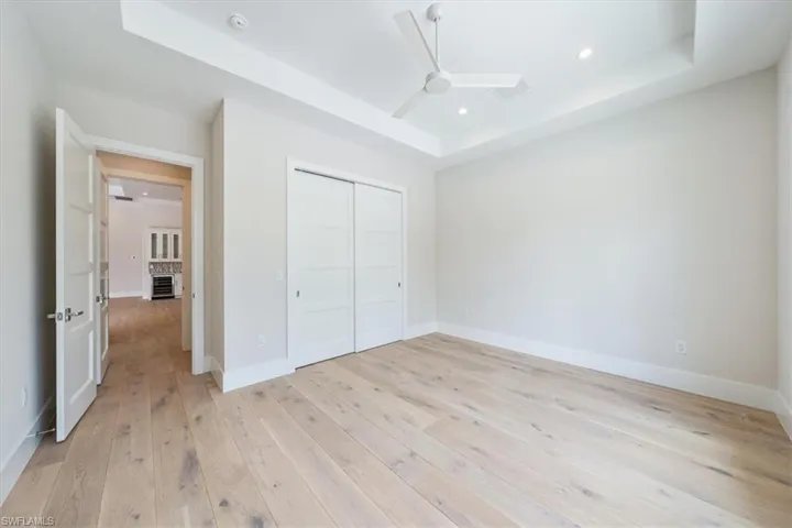 Bedroom 4 is located in the front of the home - this room is flooded with natural light and sets the stage for a light and bright office or flex room.