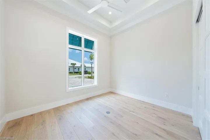 Bedroom 4 is located in the front of the home - this room is flooded with natural light and sets the stage for a light and bright office or flex room.