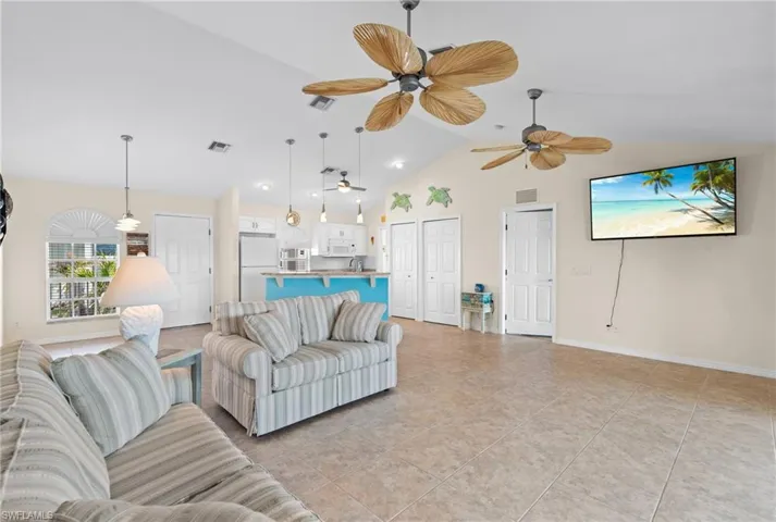 Living room with open floor plan -Virtually enhanced