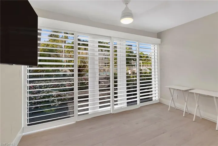 Detailed view of baseboards and wood finished floors