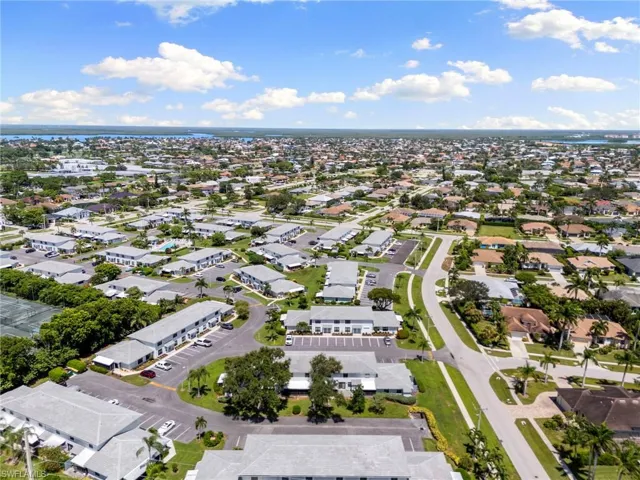 Aerial overview of property's location featuring nearby suburban area