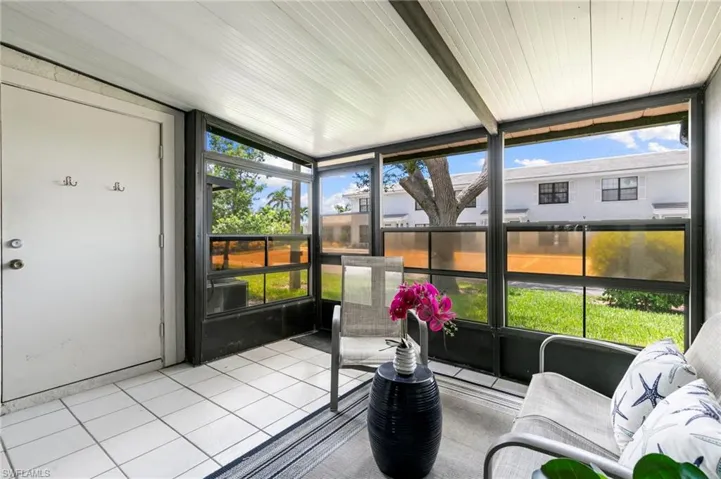 Sunroom featuring plenty of natural light