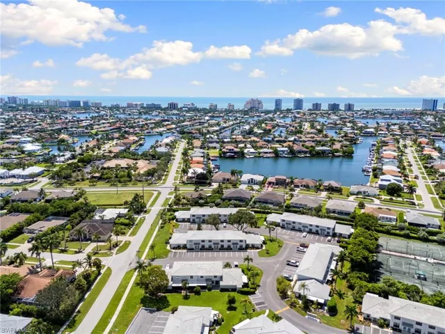 View of urban area featuring a nearby body of water and nearby suburban area