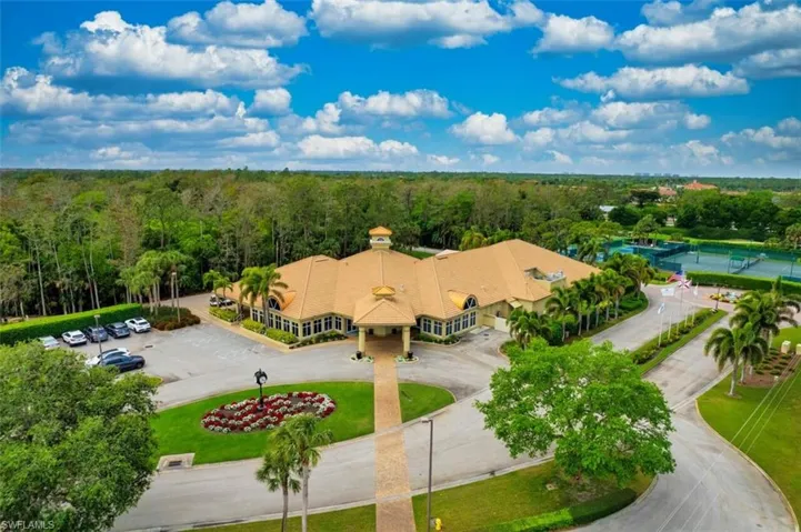 Drone / aerial view featuring a wooded view