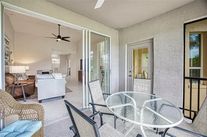 Sunroom with a ceiling fan
