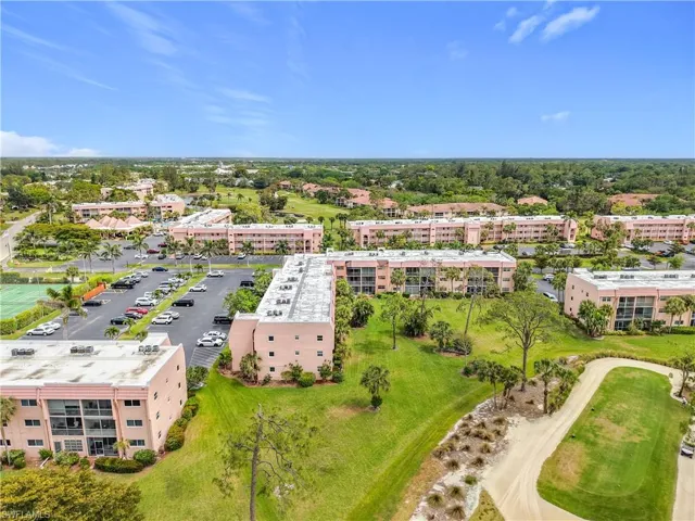 Drone / aerial view of apartment complex / building