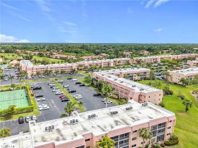 Drone / aerial view of apartment complex / building