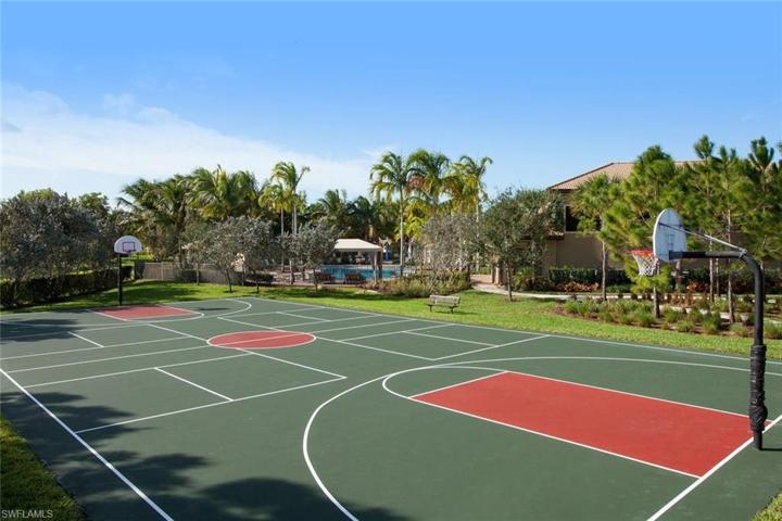 Outdoor basketball court that is also used for pickleball.