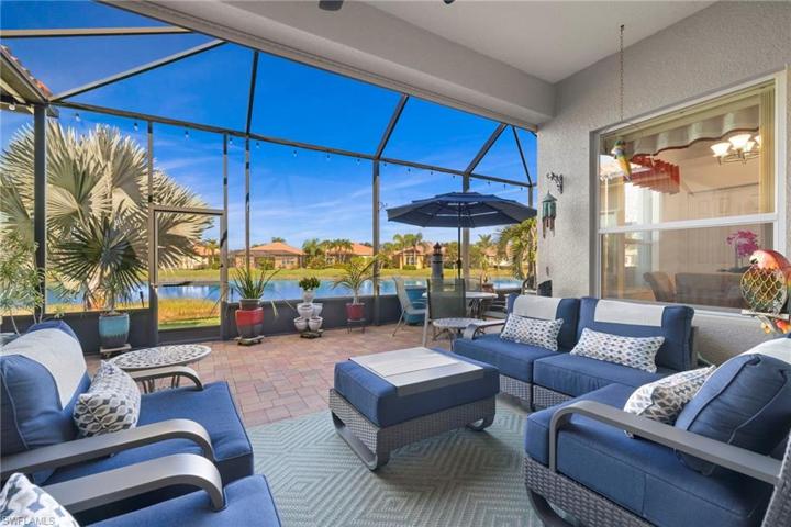 Screened in wrap around lanai with brick pavers.