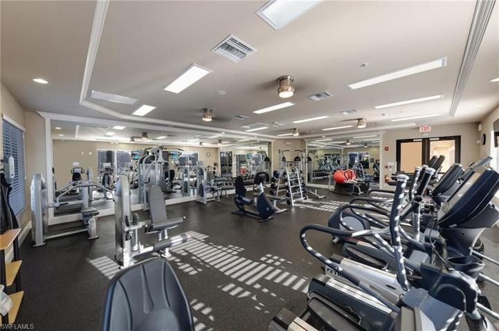 A gym with lots of equipment.