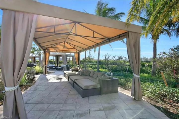 View of patio / terrace featuring an outdoor hangout area and a gazebo
