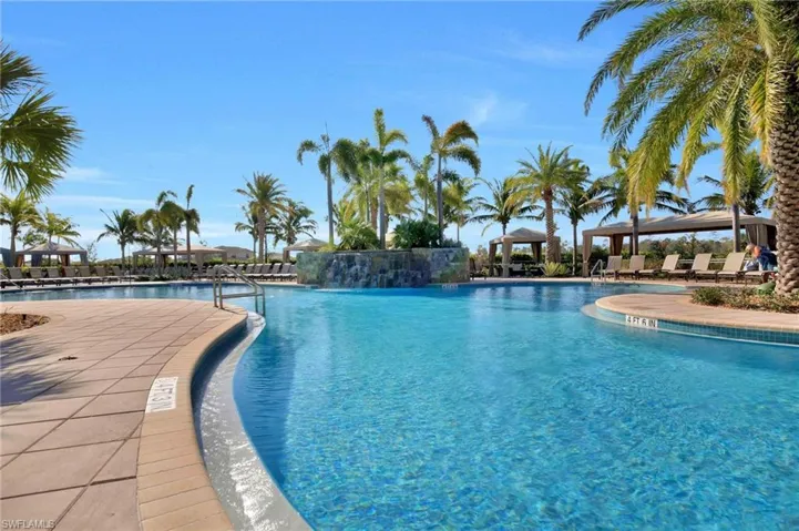 View of pool with a water view and a gazebo