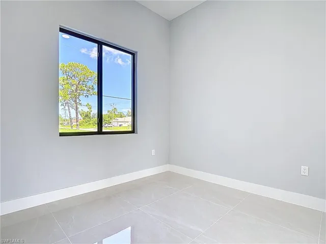 Empty room with baseboards