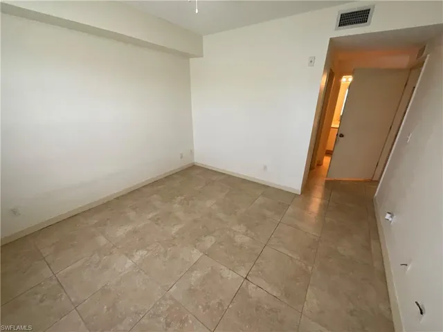Empty room with baseboards