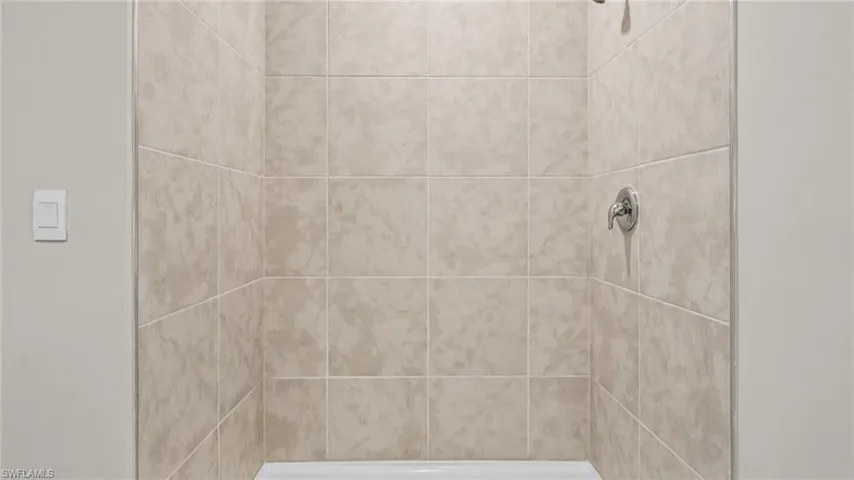 Bathroom view of a stall shower