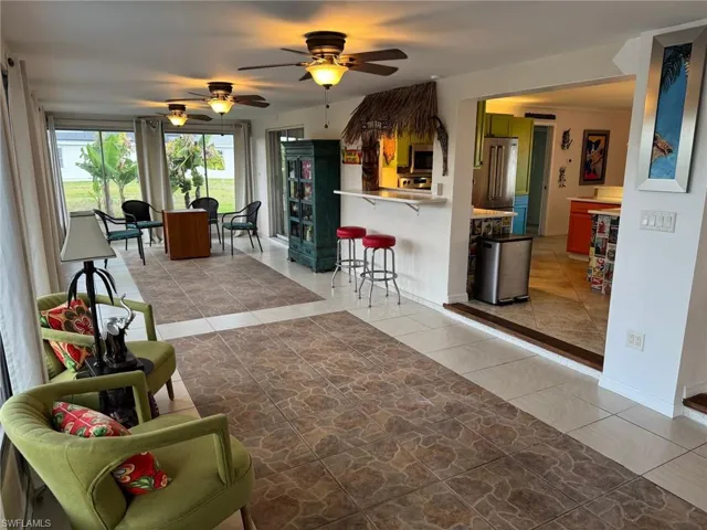 You'll want to spend a lot of your time out here is this super fun sun room off the pool.