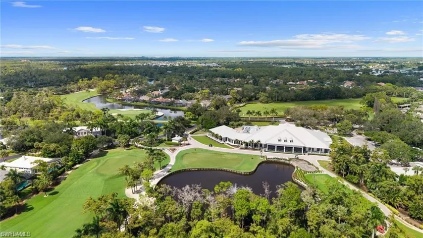 Aerial view of a nearby body of water and a local golf course