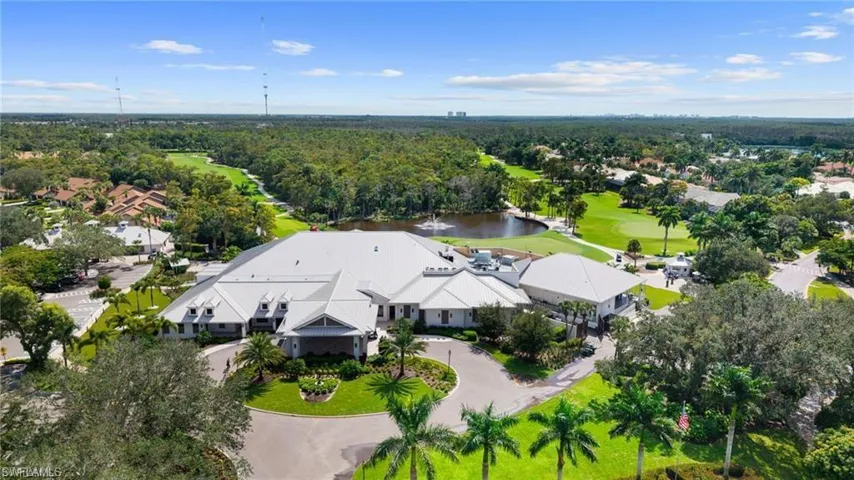 Bird's eye view of a nearby body of water and a local golf course