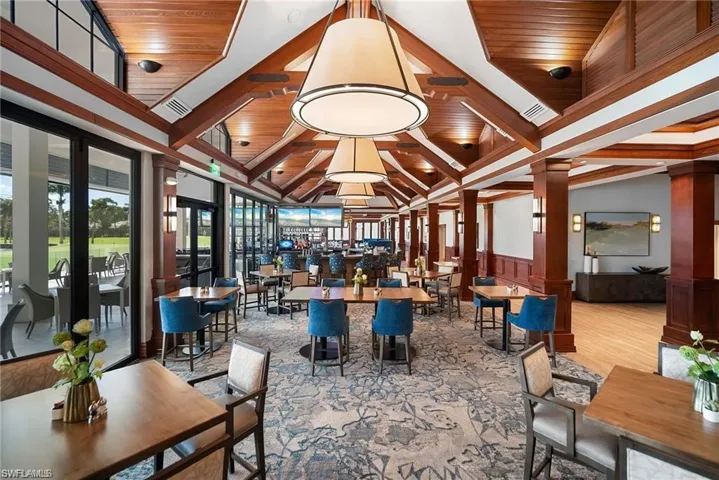 Community lobby with wooden ceiling and wainscoting
