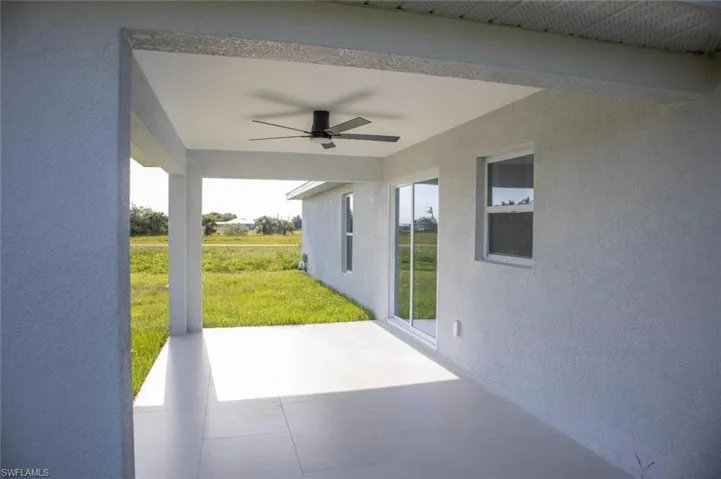 View of patio / terrace with a ceiling fan