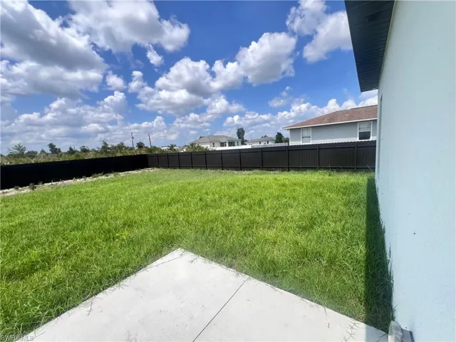 View of yard with a patio area