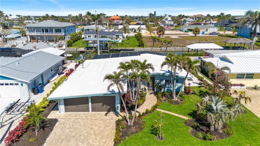 Aerial view featuring a residential view virtually enhanced image