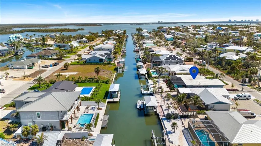 Bird's eye view featuring a water -view and a residential view - VIRTUALLY ENHANCED
