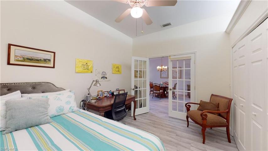 Den/bedroom with french doors
