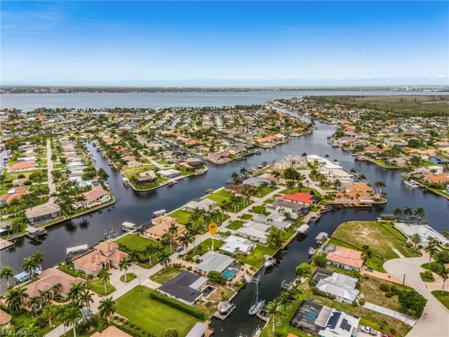 Aerial view of direct access to open water - no bridges or locks, minutes to Gulf