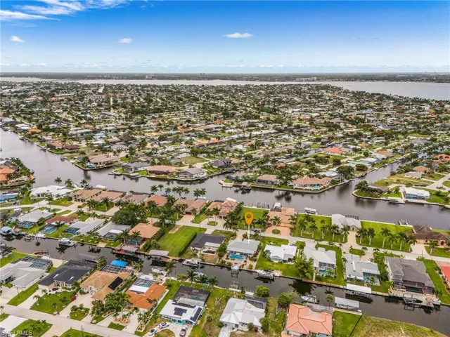 Aerial view showcasing a residential area characterized by numerous canal-front properties