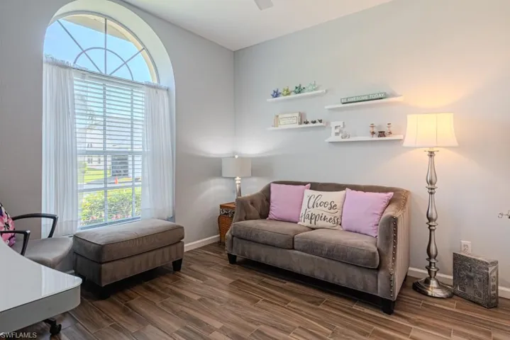 Bedroom featuring dark hardwood / wood-style flooring