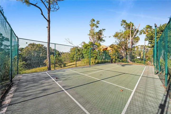 View of sport court with basketball hoop