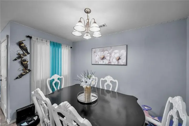 Dining area featuring a chandelier