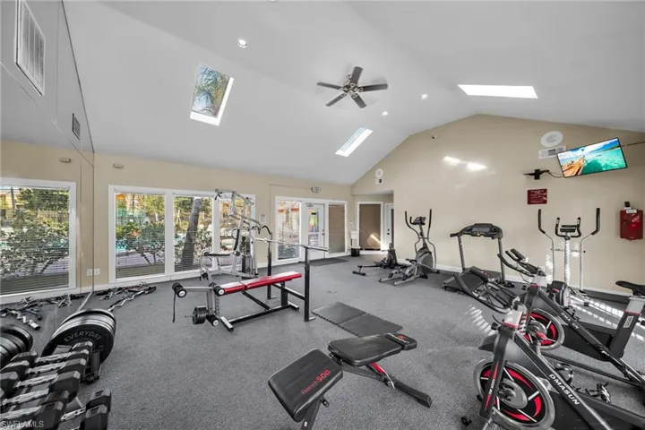 Exercise room with high vaulted ceiling