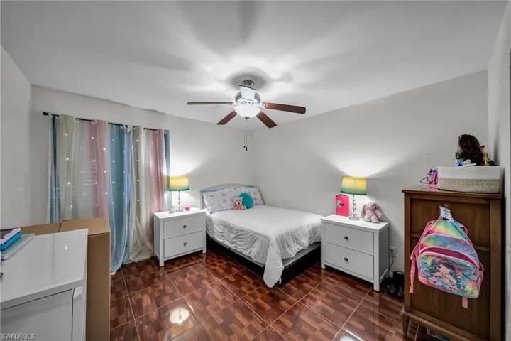 Bedroom featuring ceiling fan