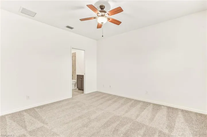 Office/ Den featuring ceiling fan and baseboards