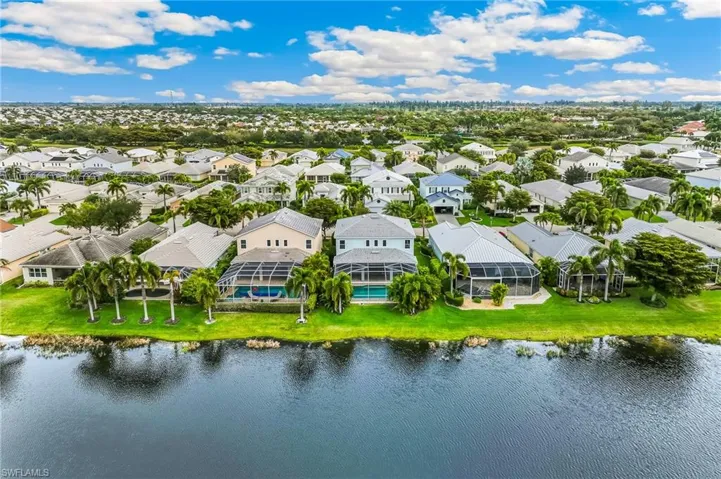 Aerial view of residential area with a nearby body of water