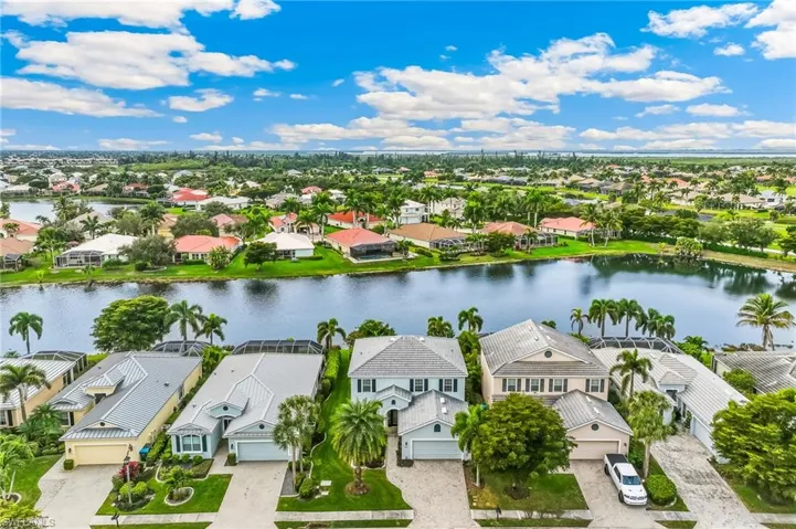 Aerial view of residential area with a nearby body of water