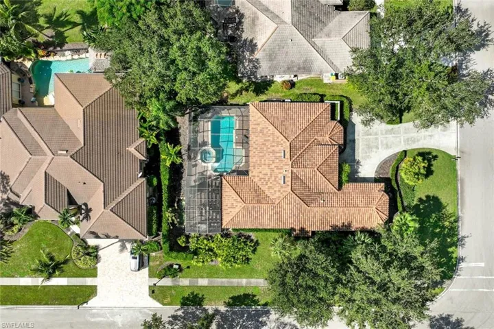 Comprehensive aerial view, showcasing the property's layout, surrounding landscape, and architectural details from a bird's-eye perspective.